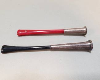 Lot 329  Pair of sterling silver and Bakelite cigarette