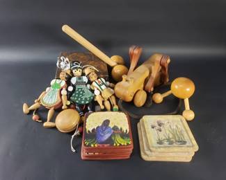 Lot 571  Carved wood toys, coasters, and trinket box