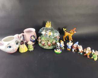 Lot 314  Group of Disney Snow White porcelain figurines,