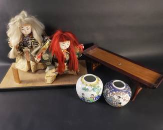 Lot 310  Group of Japanese dolls, Chinese vases, and stand