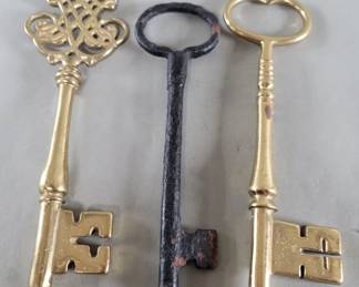 Lot 532  Two vintage brass and one antique iron skeleton