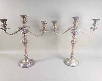009  Lot 61  Pair of sterling silver weighted candlesticks