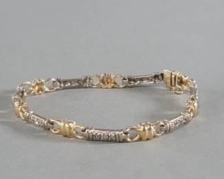 015  Lot 256  14k gold and diamond bracelet