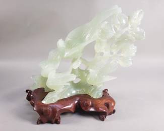 095  Lot 102  Chinese carved pale green serpentine sculpture