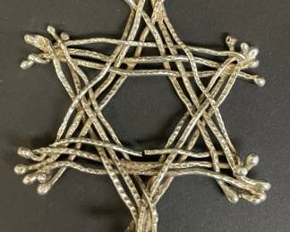Lot 534h  Vintage sterling silver abstract woven wire star