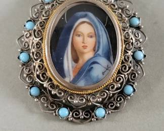 Lot 268  800 silver brooch depicting a signed hand painted