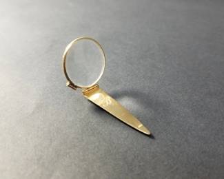 021  Lot 383  Antique 14k gold folding magnifying lens