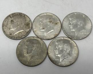 Lot 33  Group of five Kennedy half dollar coins