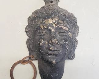 Lot 149  Vintage cast iron African wall plaque