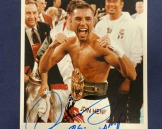 Lot 411h  Oscar De La Hoya signed 8 x 10 photo in blue