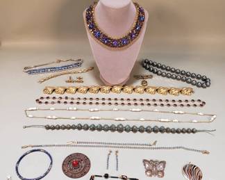 Lot 354  Group of costume jewelry, violet collar, brooch