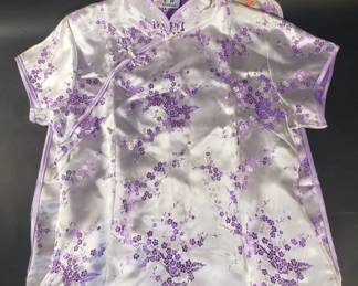 Lot 360  Group of Asian dresses and scarfs