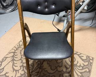 4 vintage black folding chairs