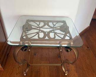 GOLDTONED GLASS TOP TABLE 28X24X2' X2 $90.00