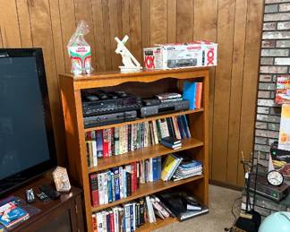 Nice Bookshelf, Books, Samsung TV, VHS player, DVD player, VHS movies