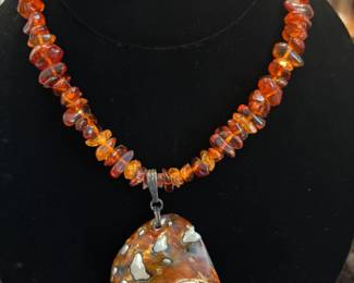 Amber Necklace with Turbo Petholadus Shell