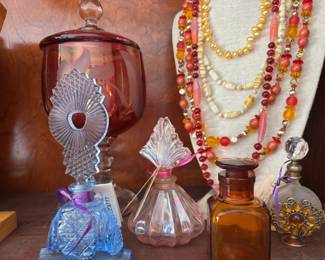 Various Vintage Perfume Bottles, Glass Necklaces andf Pink Glass Jar
