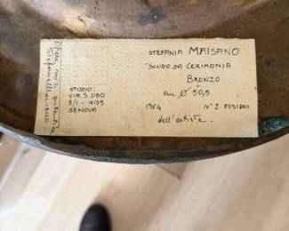 Rare Bronze Decorative Disk Wall Hanging back and Artist label show. Along with exhibition sticker