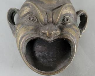 Lot 516  Vintage cast brass demon head ashtray