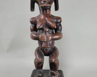 Lot 108  Carved wood Fang reliquary guardian figure