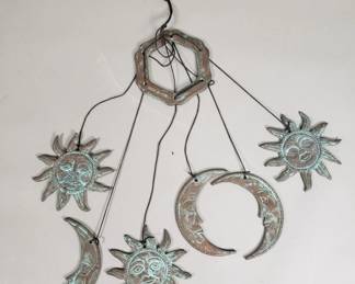 Lot 529  Vintage brass sun and moon motif wind chime
