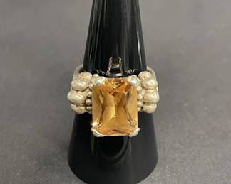 Lot 555h  Sterling silver ring with faceted gemstone
