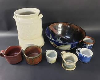 Lot 333  Group of vintage studio pottery mugs, jar, and
