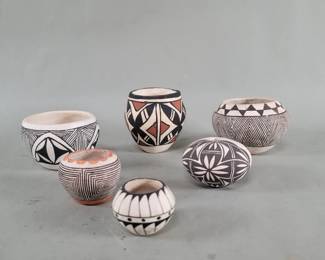 Lot 561  Six signed Native American pottery vessels