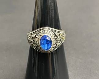 Lot 660h  Vintage sterling silver class ring with blue