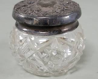 Lot 502  Vintage crystal jar with sterling silver lid