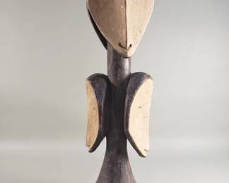 148  Lot 332  African carved wood multi headed sculpture