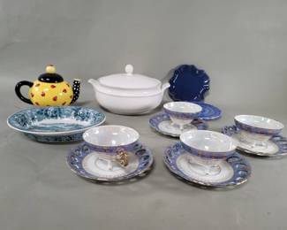 Lot 425  Porcelain cups and saucers, tureen, ceramic teapot