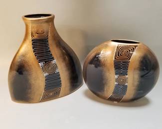 Lot 353  Signed geometric black and gold ceramic vase set