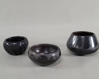 Lot 551  Three signed Native American blackware pottery