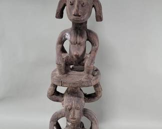 137  Lot 143  Vintage African hand carved stacked figural wood