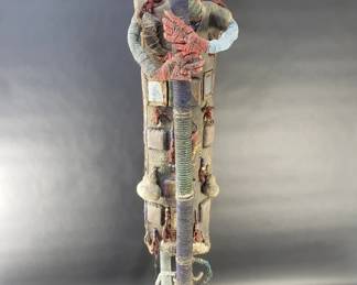 150  Lot 342  Vintage African sculpture with adorned beads,