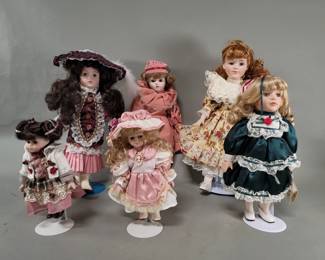 Lot 428  Group of porcelain dolls