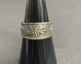 Lot 565h  Sterling silver openback Kokopelli ring