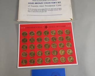 153  Lot 473  Collection of Franklin Mint solid bronze