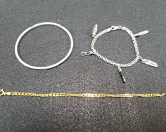 Lot 115  3 sterling silver bracelets, bangle, gold wash