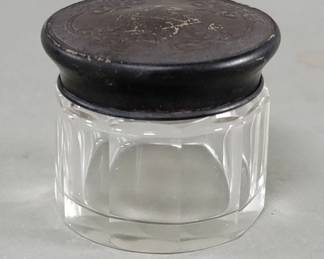 Lot 519  Vintage jar with sterling silver lid