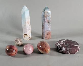 Lot 417  Group of pink jasper egg form figures ocean