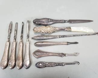 Lot 30  Group of Sterling handled items, letter opener,