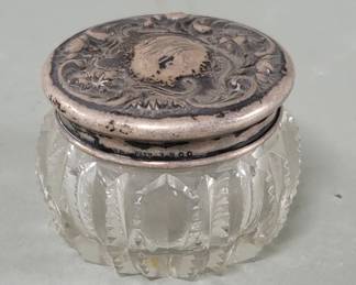 Lot 474  Vintage crystal jar with sterling silver lid
