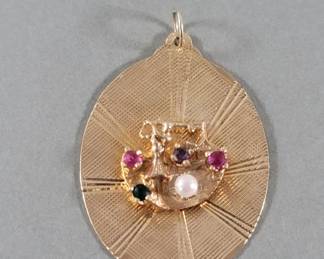 014  Lot 347  14k gold pendant adorned with rhinestones and