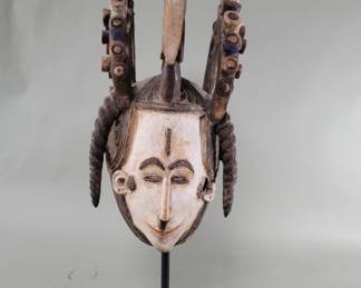 129  Lot 119  Igbo maiden spirit helmet mask from Nigeria