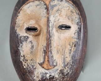 128  Lot 116  Vintage African carved wood mask