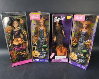 167  Lot 308  4 Mattel Barbie Halloween dolls