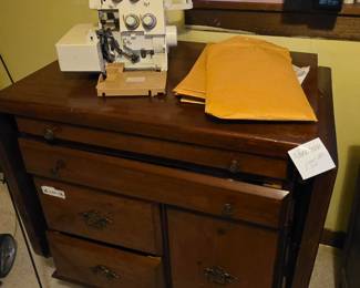 work table with side arms and plenty of storage