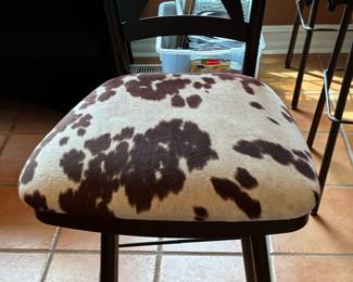 Cowhide Upholstered Swivel Bar Stool